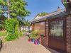 Gepflegtes Einfamilienhaus mit 707 m² Grundstück, Wintergarten, Doppelgarage & Carport - Gepflasterter Zugang zum Haus